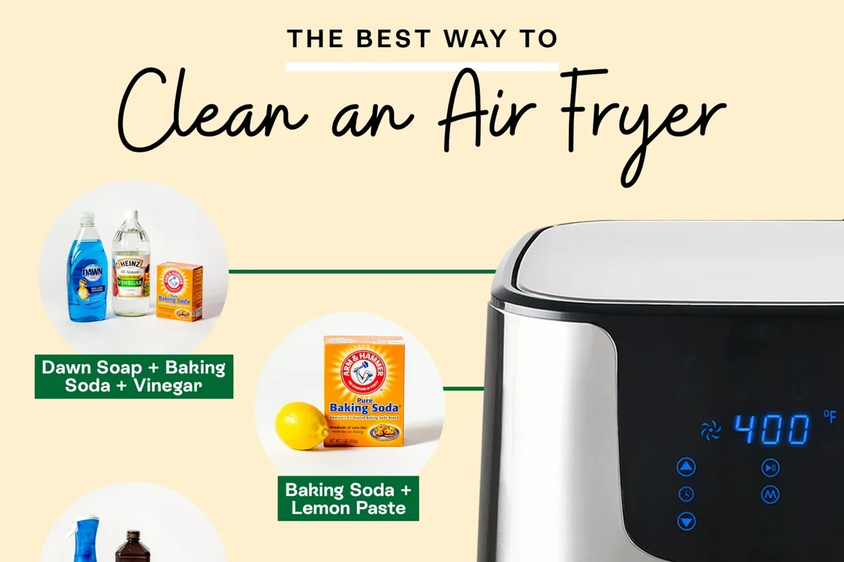 Air fryer basket and removable tray cleaned on a kitchen counter with mild soap and cloth
