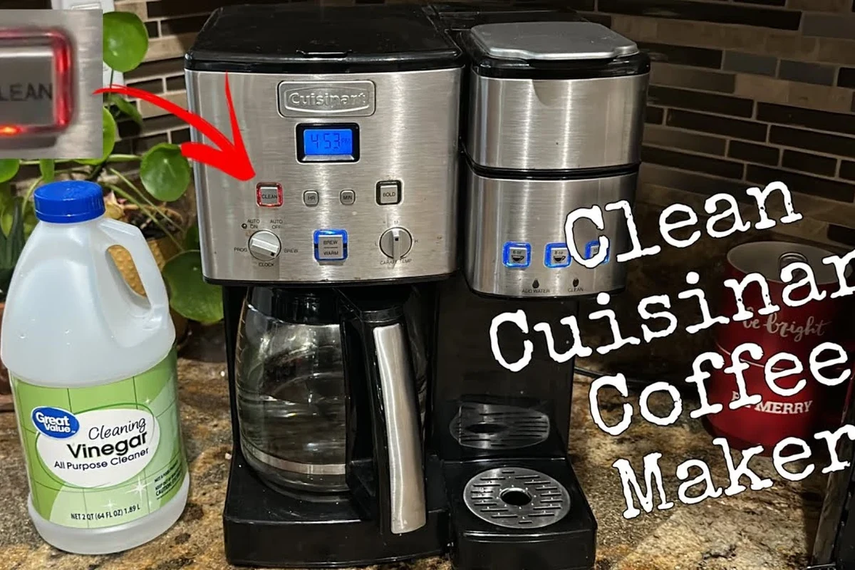 French press coffee maker with brewed coffee on a clean kitchen counter