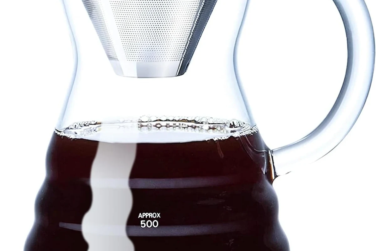 French press coffee maker with brewed coffee on a kitchen counter