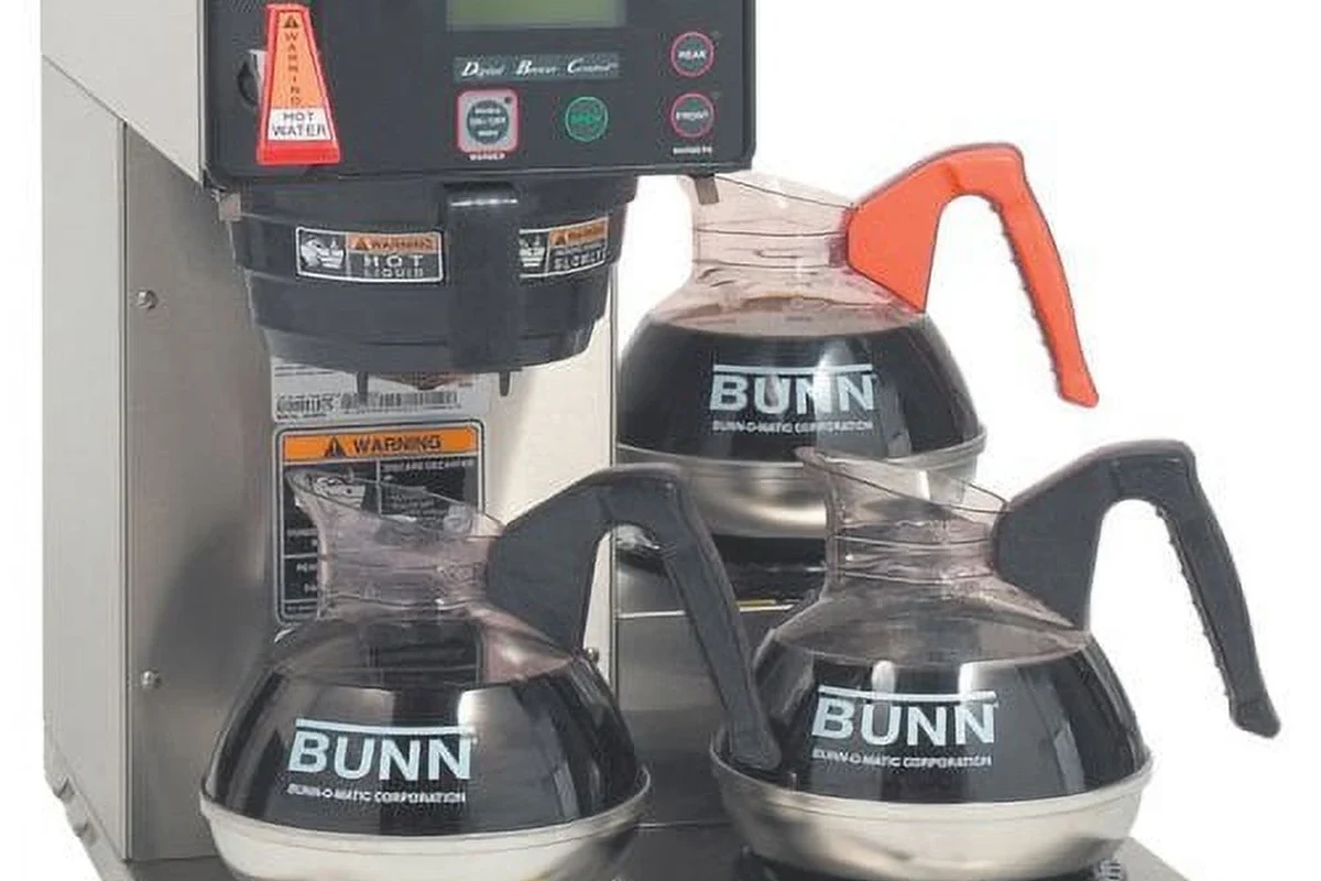French press coffee maker with brewed coffee on a kitchen counter