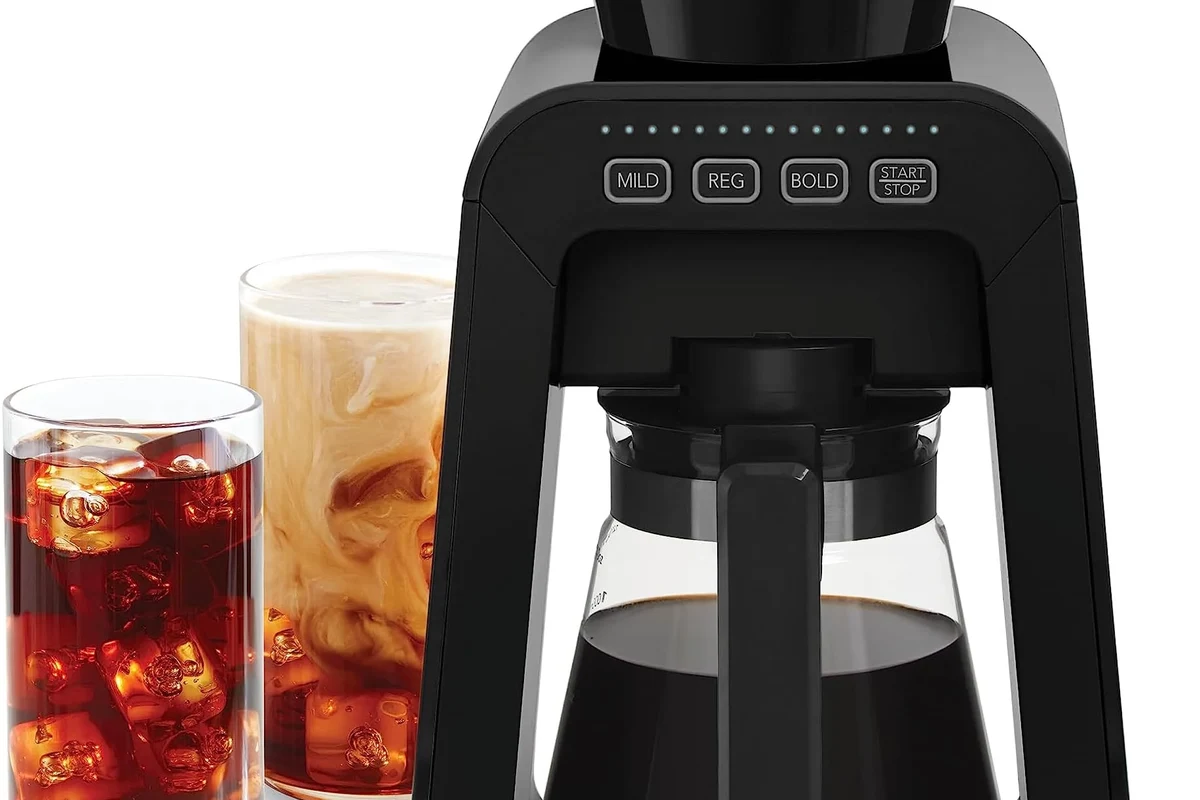 Cold brew coffee maker, French press, and jar setup on a kitchen counter
