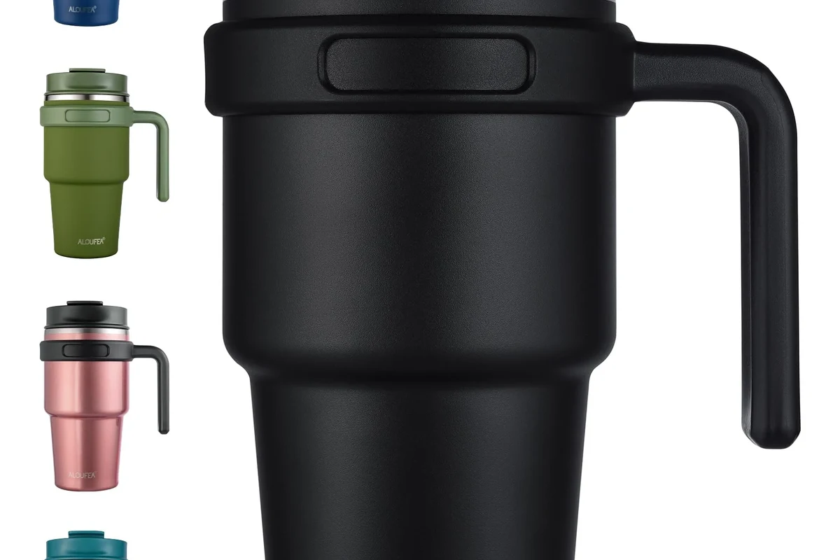 Coffee mug packed safely in a carry on suitcase with soft clothing around it