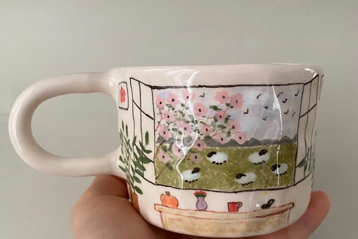Ceramic coffee mugs being shaped, glazed, and fired in a kiln