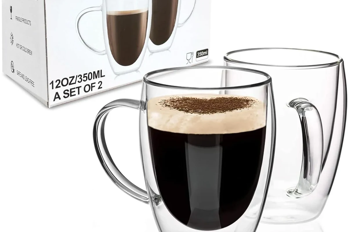 Double walled coffee mug holding hot coffee on a kitchen counter