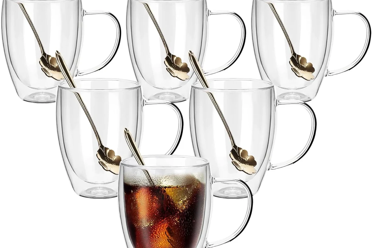 Double walled coffee mug holding hot coffee on a kitchen counter