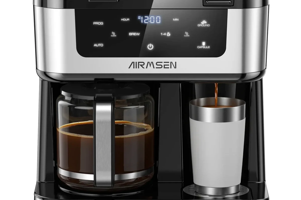 French press coffee maker parts laid out on a kitchen counter for assembly