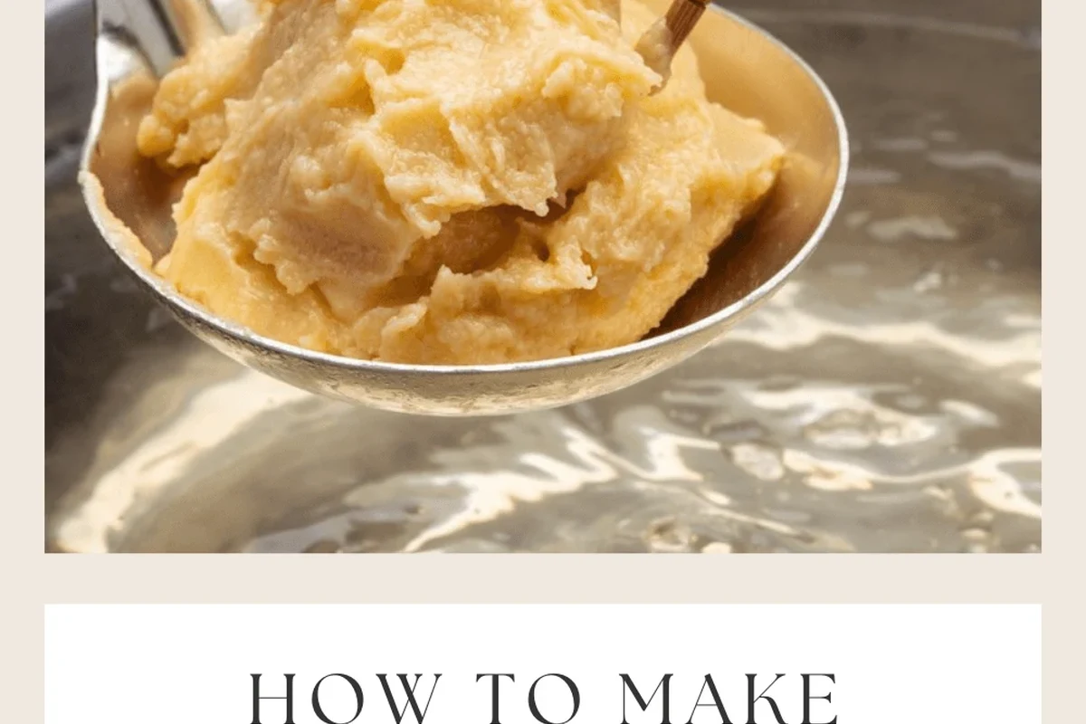 Homemade miso paste ingredients and fermentation jar on a clean kitchen counter
