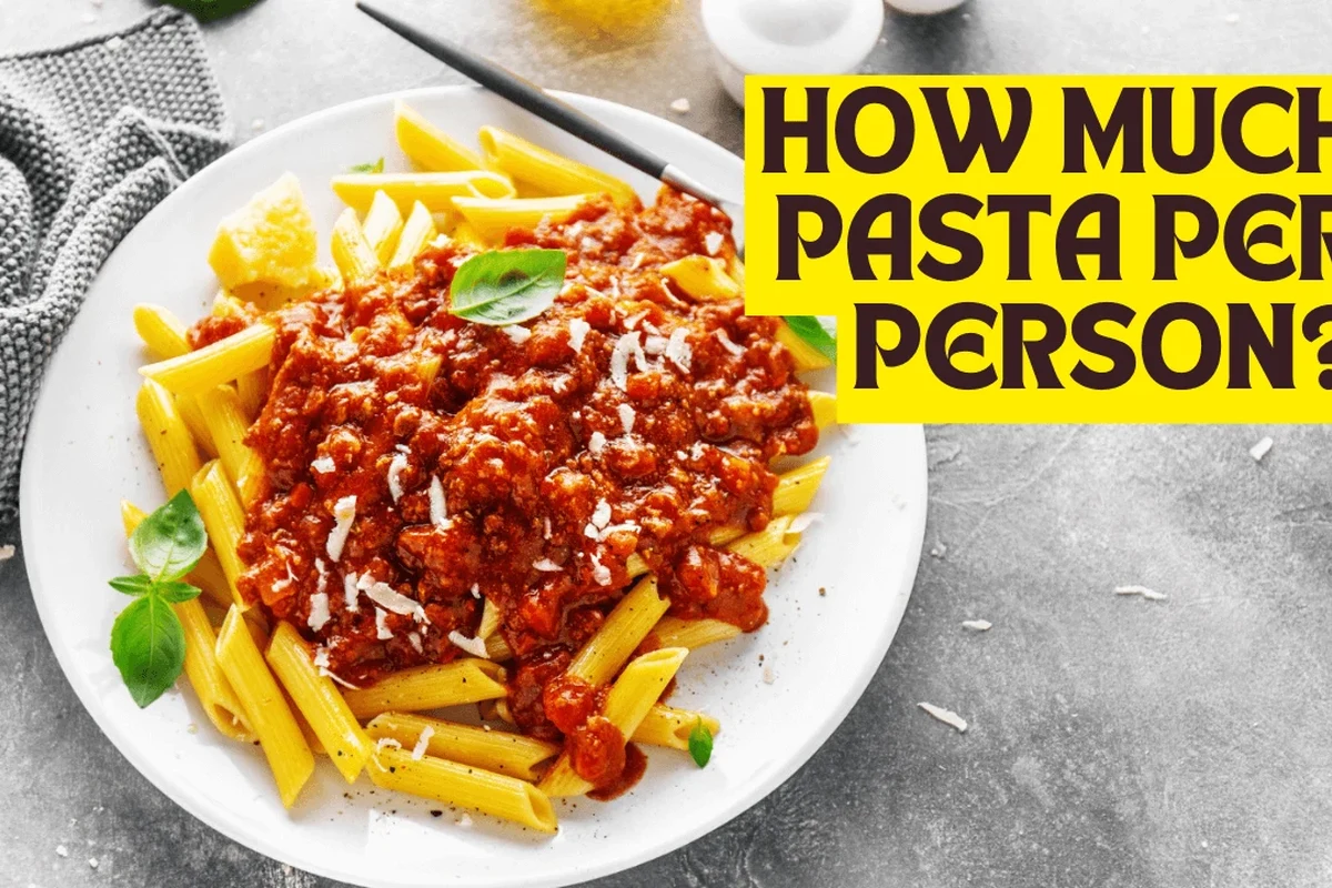 Dry penne pasta portioned in a bowl beside measuring cups in a bright home kitchen