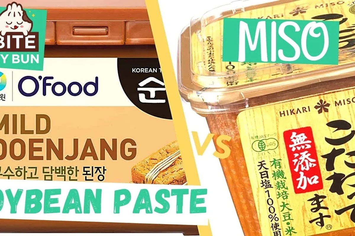 Fermented soybean paste and miso jars with spoons on a kitchen counter