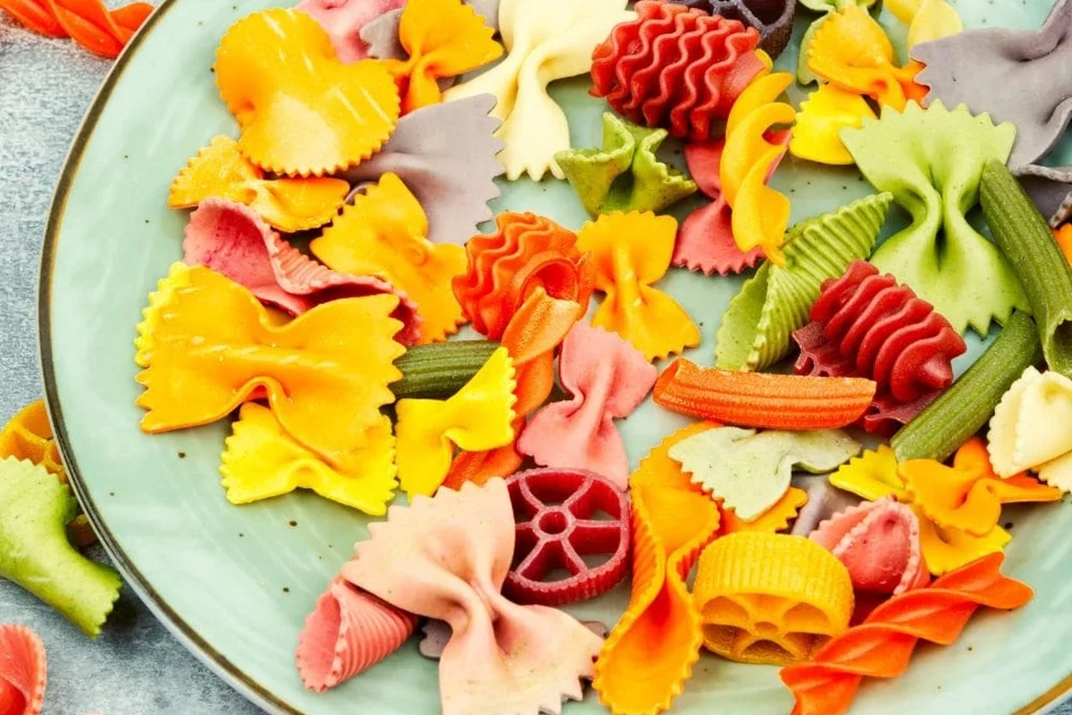Dry pasta in a pantry bowl with signs of spoilage check, including clumps and package inspection