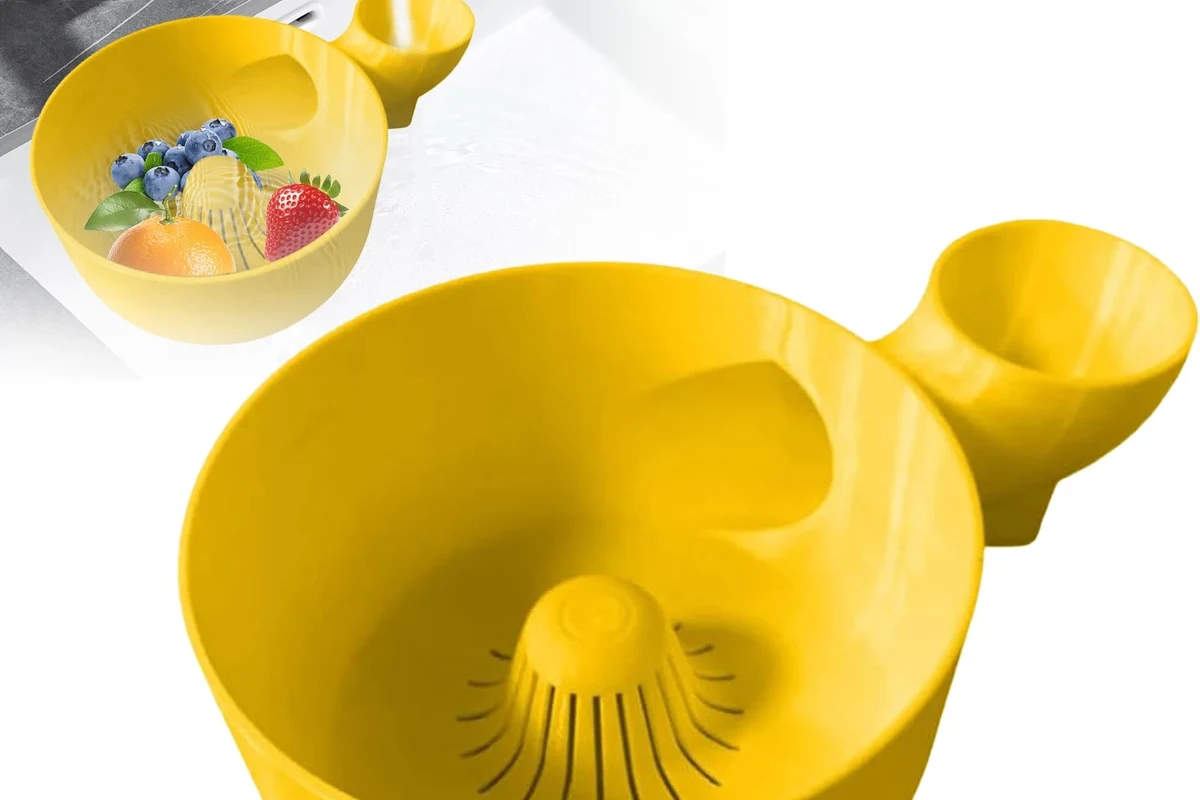 Air fryer basket, tray, and cleaning supplies arranged on a kitchen counter for deep cleaning