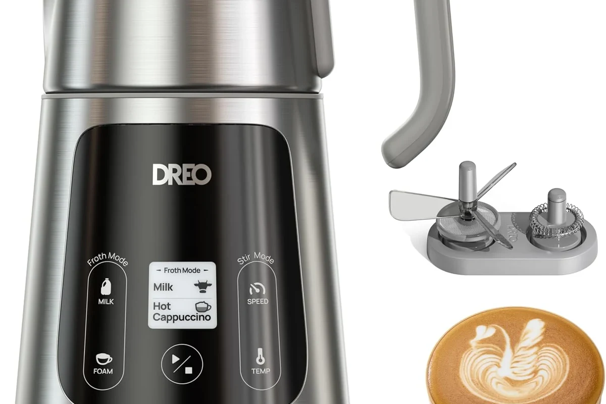 Electric milk frother making smooth milk foam for simple latte art in a home kitchen